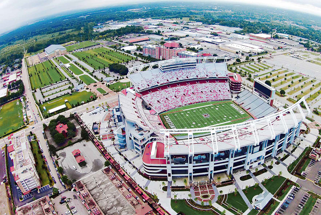Aerial view of a large football stadium filled with fans.